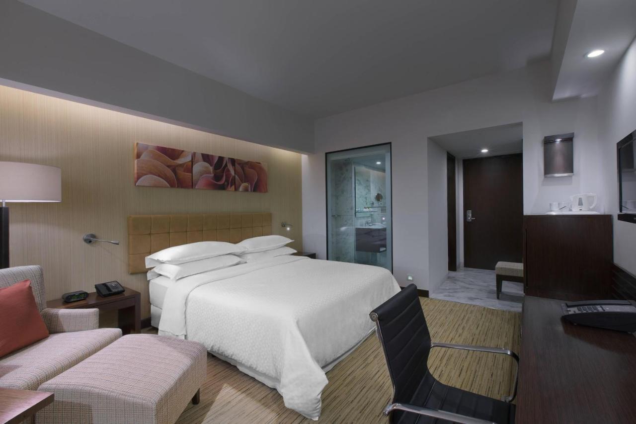 Four Points By Sheraton Hotel And Serviced Apartments Púna Exteriér fotografie